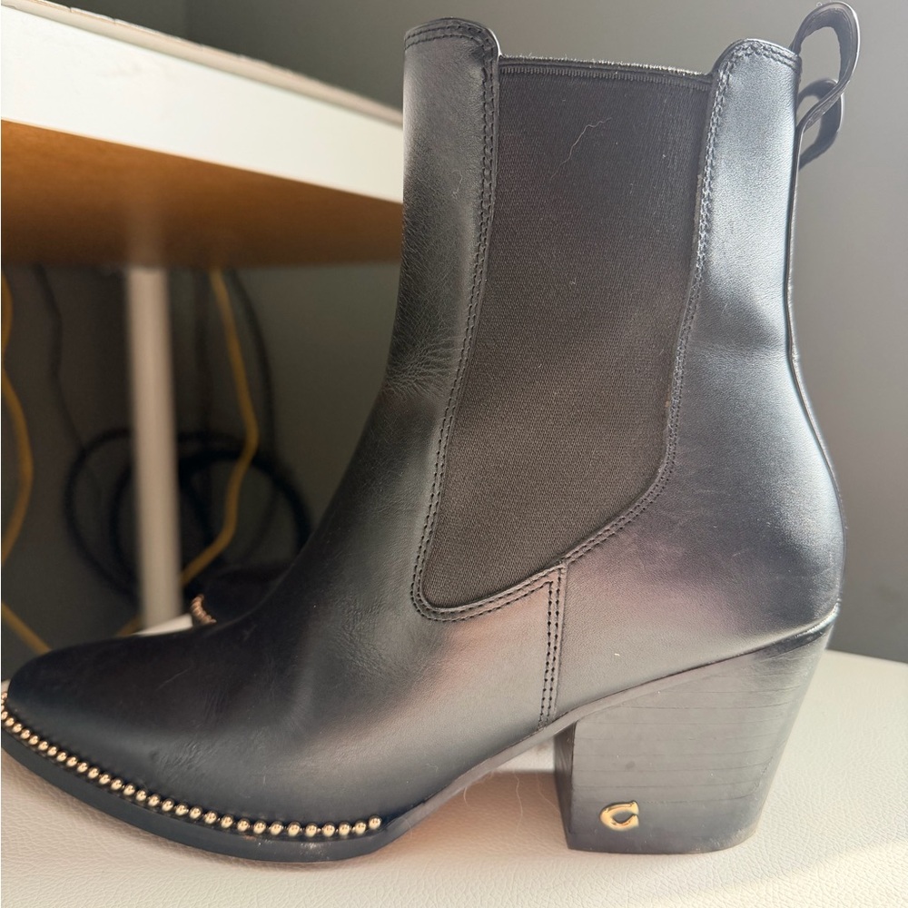 Coach Black Leather Ankle Booties with Gold Accents